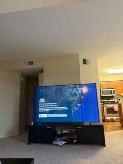 Samsung QLED 75inch TV with tv table