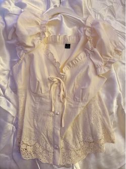 cream blouse