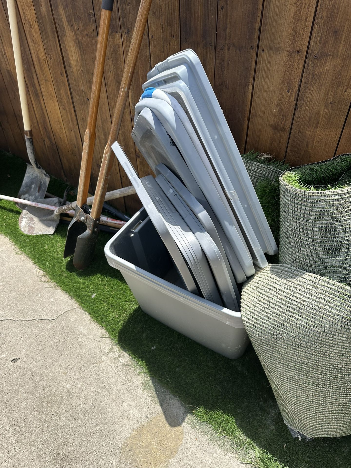 A Bunch Of Grey Storage Container With Kids