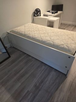 Full bed frame with two drawers underneath and mattress