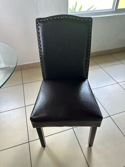 Glass Dining Table with Six  Brown Tufted Dining Chairs