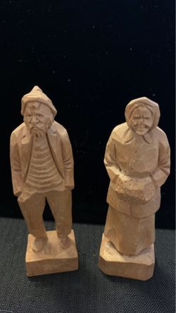 Hand carved man and woman