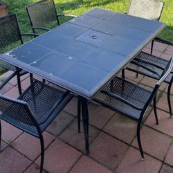 Table with 6 chairs and a patio bin use
