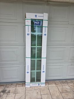 Brand New 17.5W x 68.5H PGT Impact Vinyl Casement window