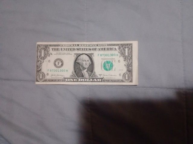 Miscut One Dollar Bill