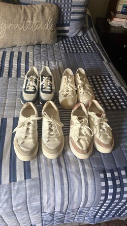 4 women shoes 1 Michael Kors 2 tory Burch and 1 converse