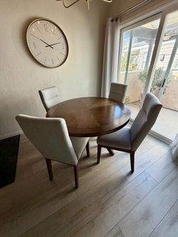 Round dining table with chairs