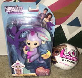 Brand new two tone Sydney from toys r us and LOL fingerlings surprise glitter series