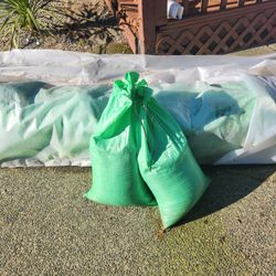 Sandbags, Funnels And Sand 