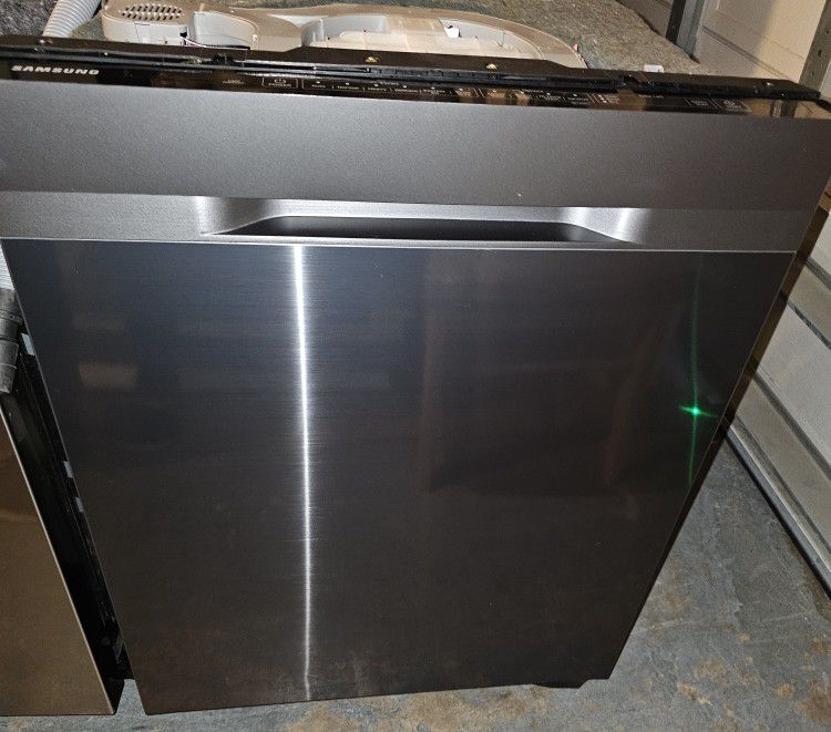 SAMSUNG DARK STAINLESS STEEL DISHWASHER WITH INTERIOR STAINLESS STEEL TOO AND  3 RACKS.....$ 300