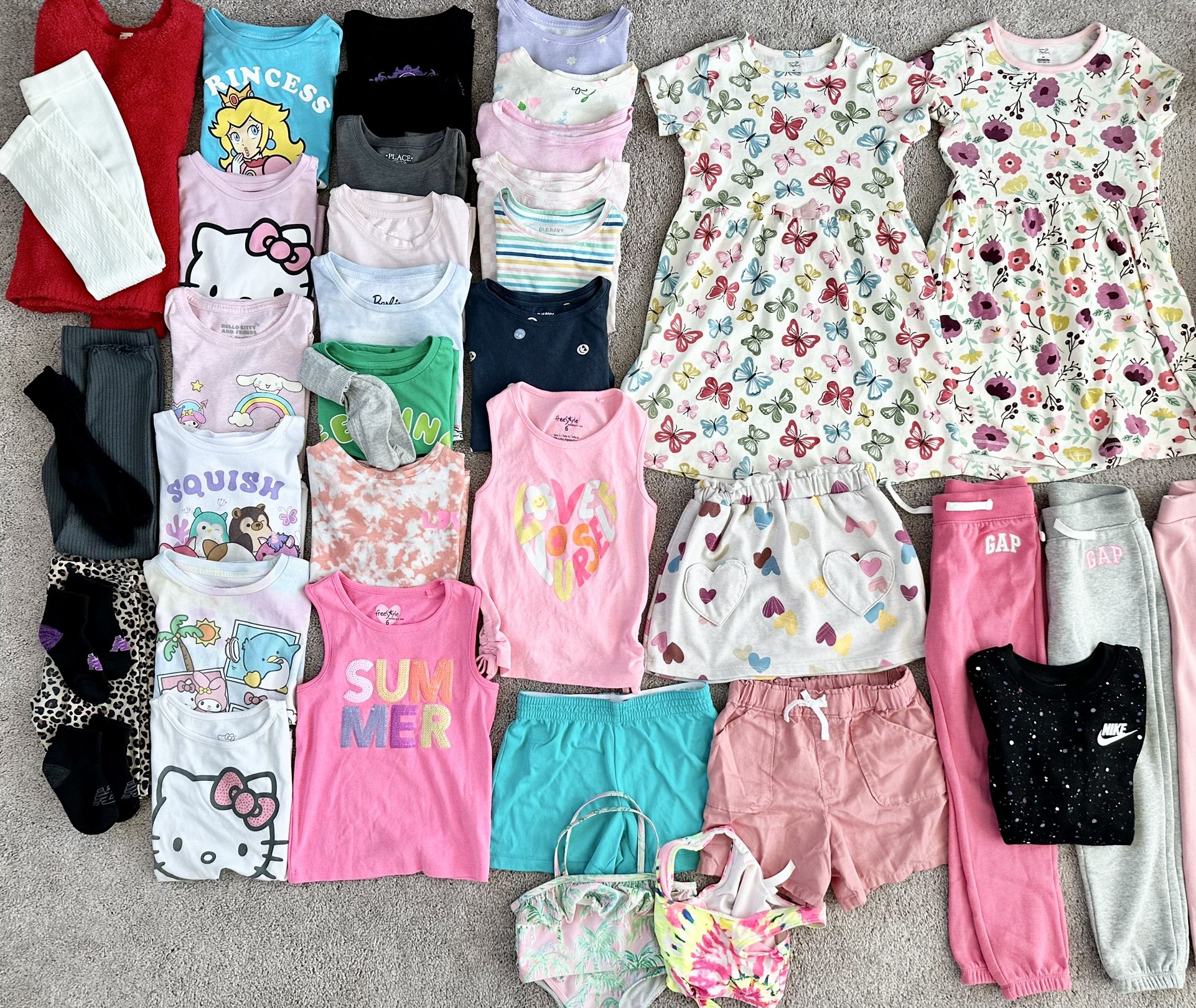 Bundle Of Girls Clothes SuperMario, Hello Kitty, Disney, Champion, Gap Kids, Touch By Nature, Barbie Size(5T - 6) Lot(60)