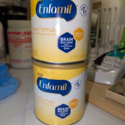 Two Enfamil Cans
