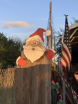 Christmas Santa On Wood Fence 