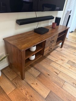 TV stand, natural wood, chairs and lamps