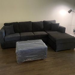Dark Grey Sectional With free Ottoman 