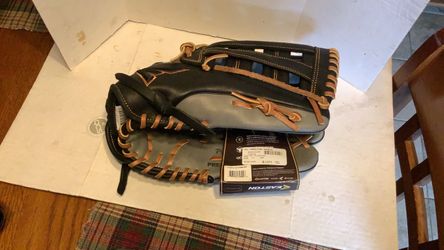 Easton Professional baseball  glove model 14” glove.  Real leather Brand new, rht designed with a wide heel and deep pocket, adjustable wrist for perf