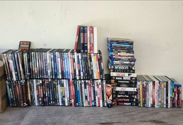 Lot of dvd, blue ray, and vcr movies