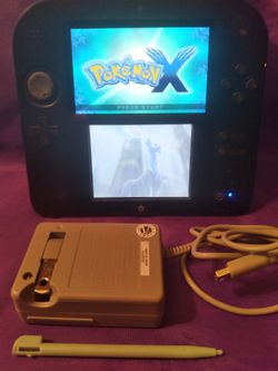 Nintendo 2-DS portable gaming system that comes with Pokemon X