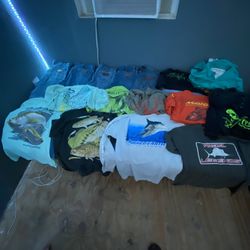 Fishing shirts and wranglers.