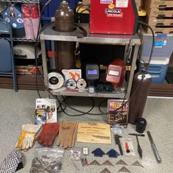 Lincoln Electric SP 125 Plus Gas/Electric MiG Welder with accessories.