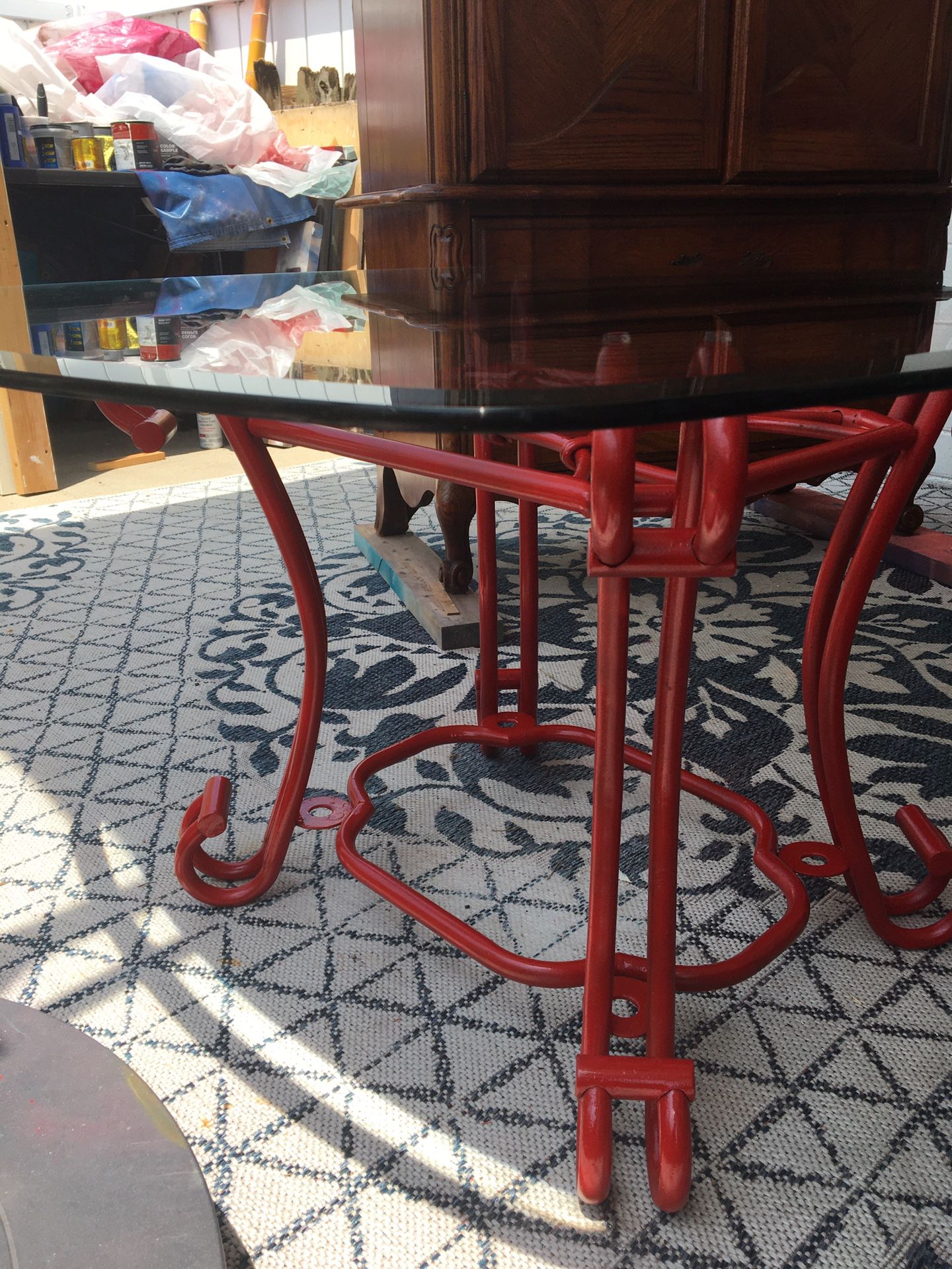 Must go!!! Beveled glass top table in sunset red metal base