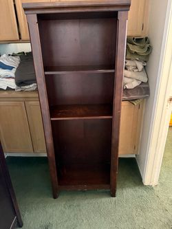 Dark wood bookshelf