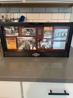 Harley Davidson 2011 collectible shadow box with cool pics in plastic frame - can stand on its own or hang on wall