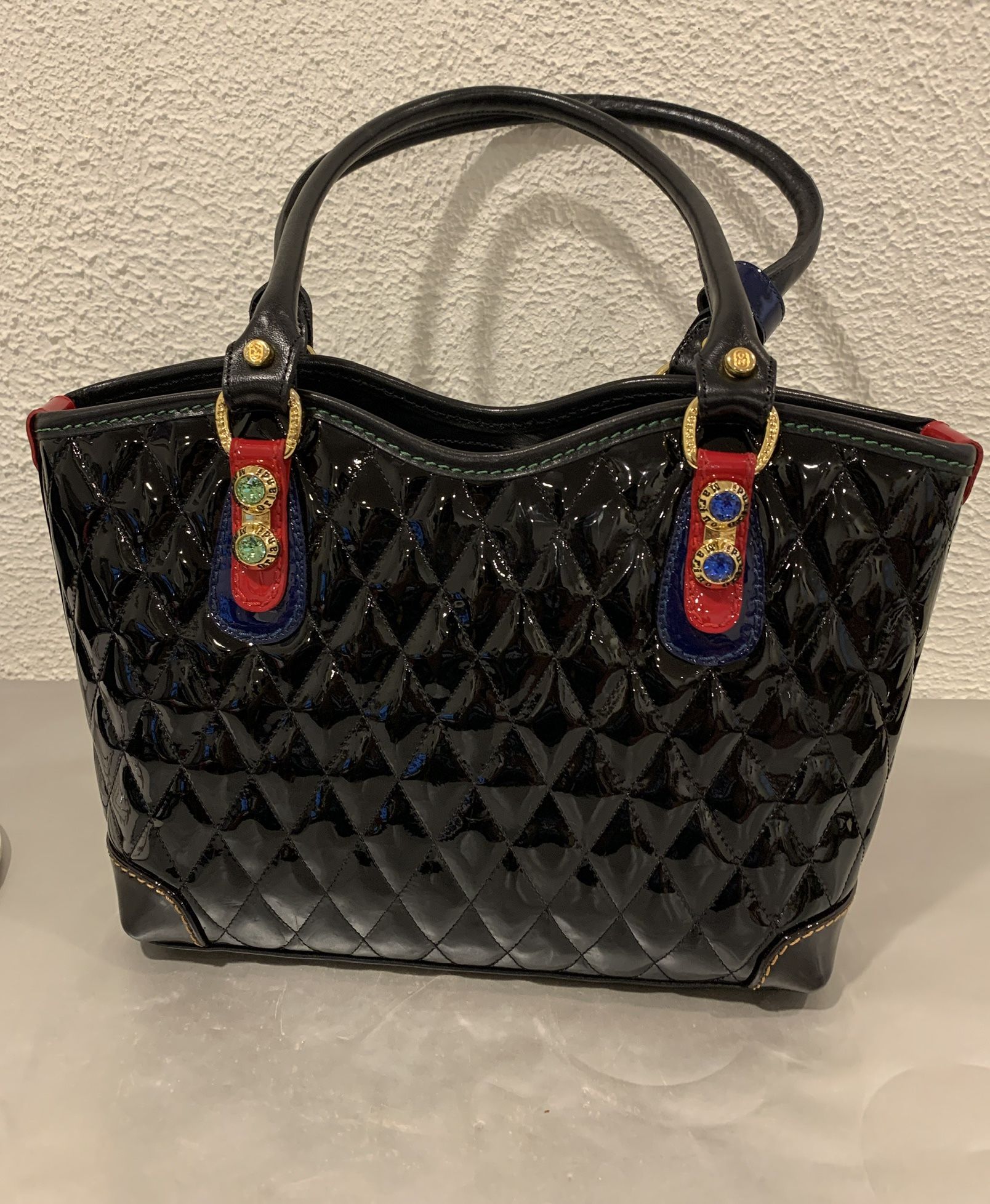 Marino Orlandi embossed original leather bag like new , no tag , top handle 14” wide 9.25”tall you see it here , it is available High quality bag Loc