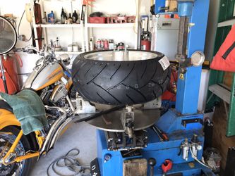 Motorcycle tire mounted as you wait.