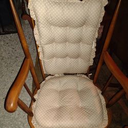 Nice Wooden Rocking Chair With Tan Cushions