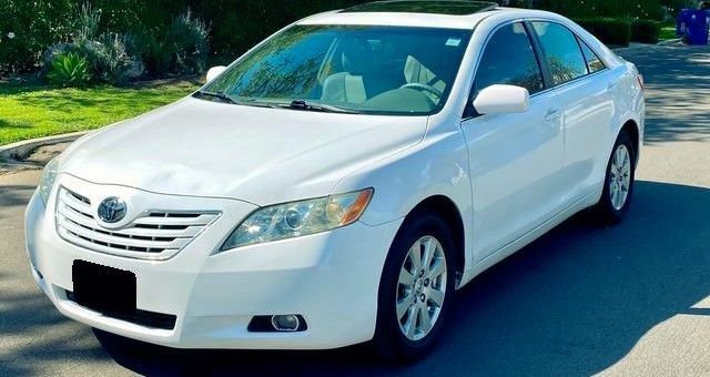 Sell my. 2009ToyotaCamry XLE FWD-Wheel
