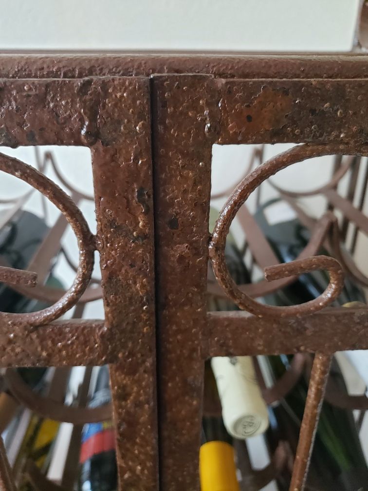 Rod iron wine rack. Sturdy and heavy