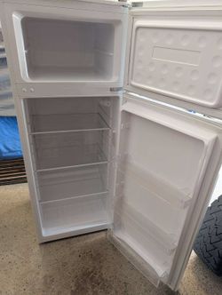 Magic Chef 55”tall 22”width selling for $150