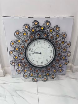 Beautiful clock/Boho theme with orange arrangements