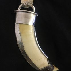Custom, hand made, Sterling Silver an 8kt Gold, Genuine Boar tooth pendant, over all 6” length, 1” width. $175