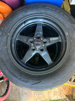 Two tires with rims