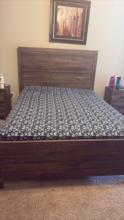 Beautiful queen bed with mattress available for sale
