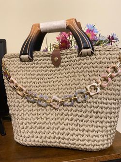 Handmade crochet bag with wooden handles and internal organizer
