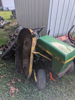 2 John Deere 111's