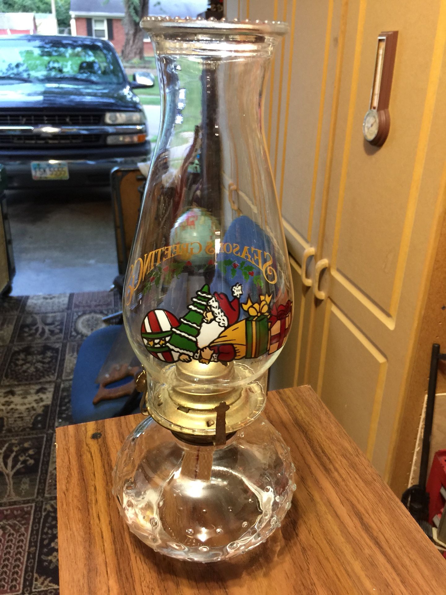 Vintage oil lamp with Christmas globe