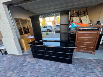 Large black dresser with mirror