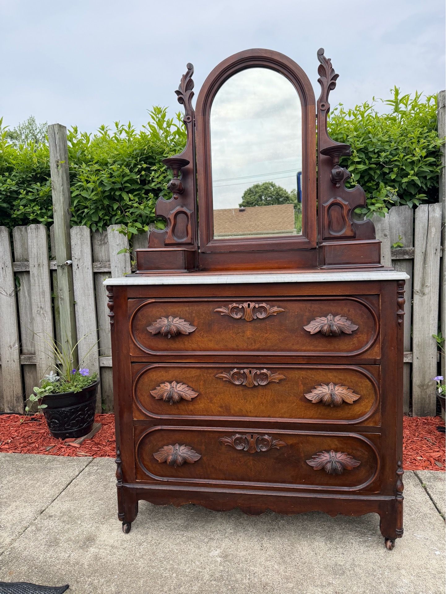 Antique Dresser rolls on casters