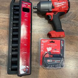 Milwaukee fuel m18 1/2” high torque impact wrench with new battery and SAE 1/2” deep socket set