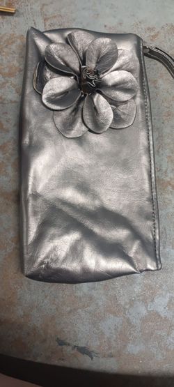 New, small silver clutch with flower