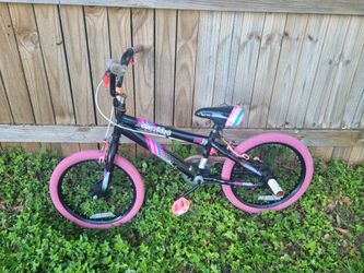 Little girls bike and scooter, and little boy's scooter