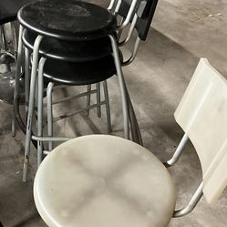 Plastic Black Stackable Chairs + White Chair