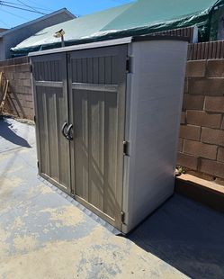 Suncast plastic storage shed double door, PRICE IS FIRM