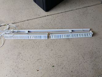Twin head "Wall Washer" high intensity commercial quality light.  Great for workshops or retail stores.