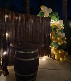 Rustic wooden barrel with table