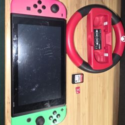 Nintendo Switch With Some Accessories 